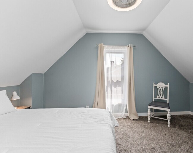 Queen bed in the third bedroom - 1110 W Grand Ave