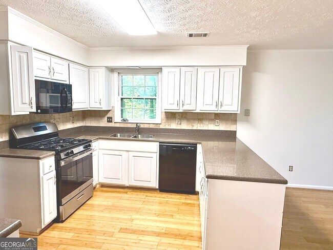 Building Photo - 3707 John Carrol Dr