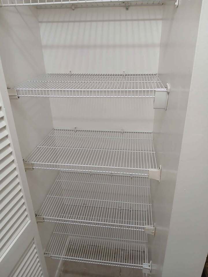 Hall linen closet - 9021 W Highland Pines Dr