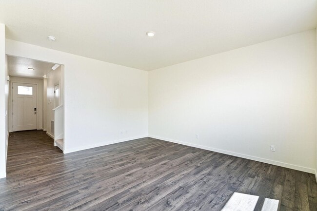 Building Photo - Spacious 4-Bedroom Wellington Home with 3-Car Garage, Loft & Fenced Backyard!