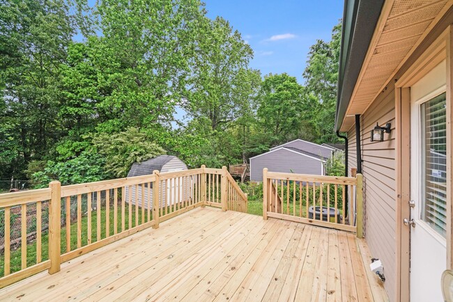 Building Photo - Fully Renovated 2BR Home with New Deck & L...