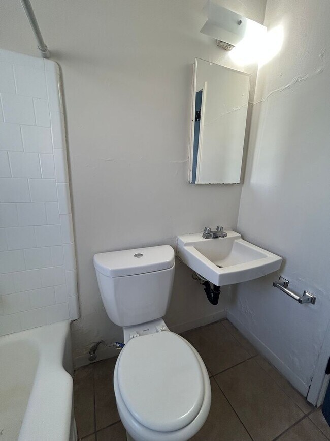 Building Photo - Two Bedroom w/ A/C, Yard and Carport