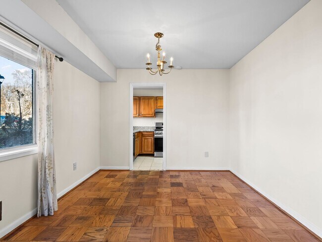 Building Photo - Commuter’s Dream! Large 2BR/2BA Condo Steps from Metro – All Utilities Included!