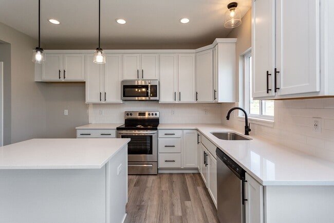 Building Photo - Spacious 4-Bedroom Home with 2-Car Garage & Yard