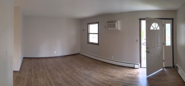 Building Photo - Conveniently located Riverbend Apartments feature a quiet community with a large green space