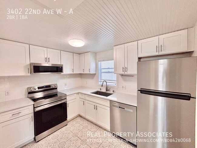 Building Photo - 3402 22nd Ave W
