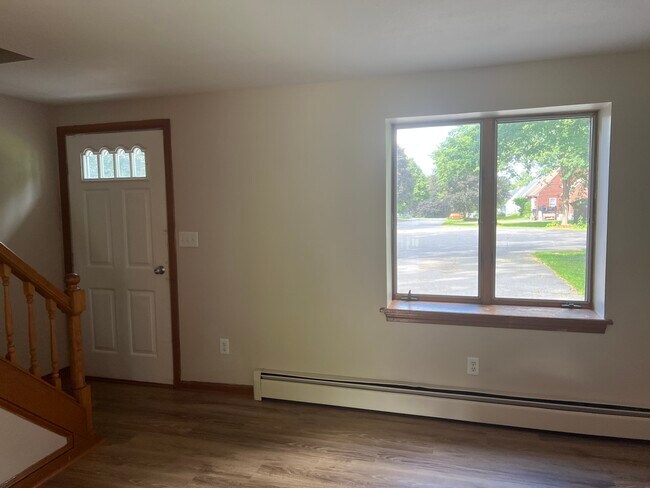 living room to front door - 16 Caryn Dr