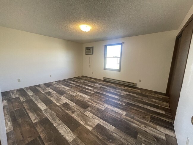 Building Photo - Two bedroom, one and bathroom townhome loc...