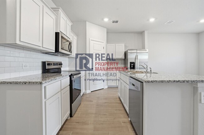 Building Photo - Comfortable 4-Bedroom Layout with Modern Finishes