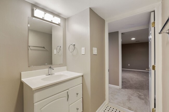 Building Photo - Move-In Ready Cape Cod with 3 Finished Levels & Huge Backyard