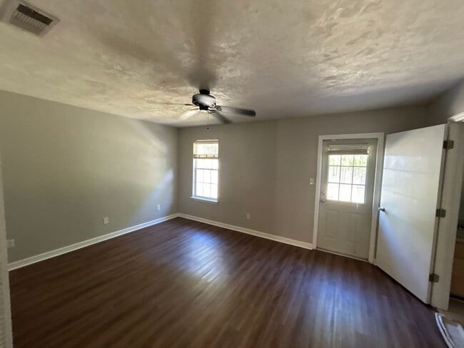 Building Photo - 2BR/2BA Townhome. BRAND NEW FLOORS