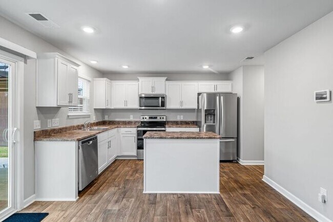 Building Photo - Newer Home in Reedy Fork, So Many Upgrades, SS Appliance, Loft, Garage, Fenced!