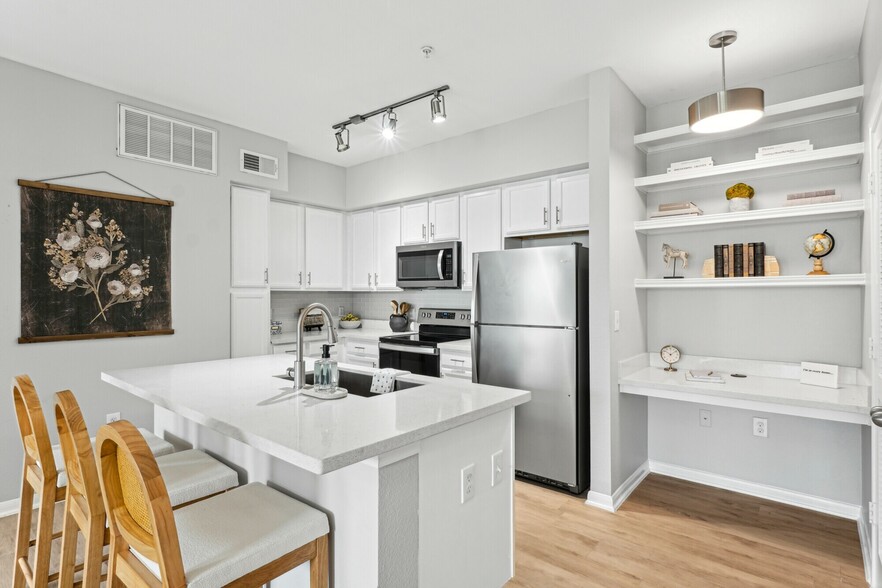 Large Kitchen with Desk Area and Kitchen Island - The Henry at Woodland Hills