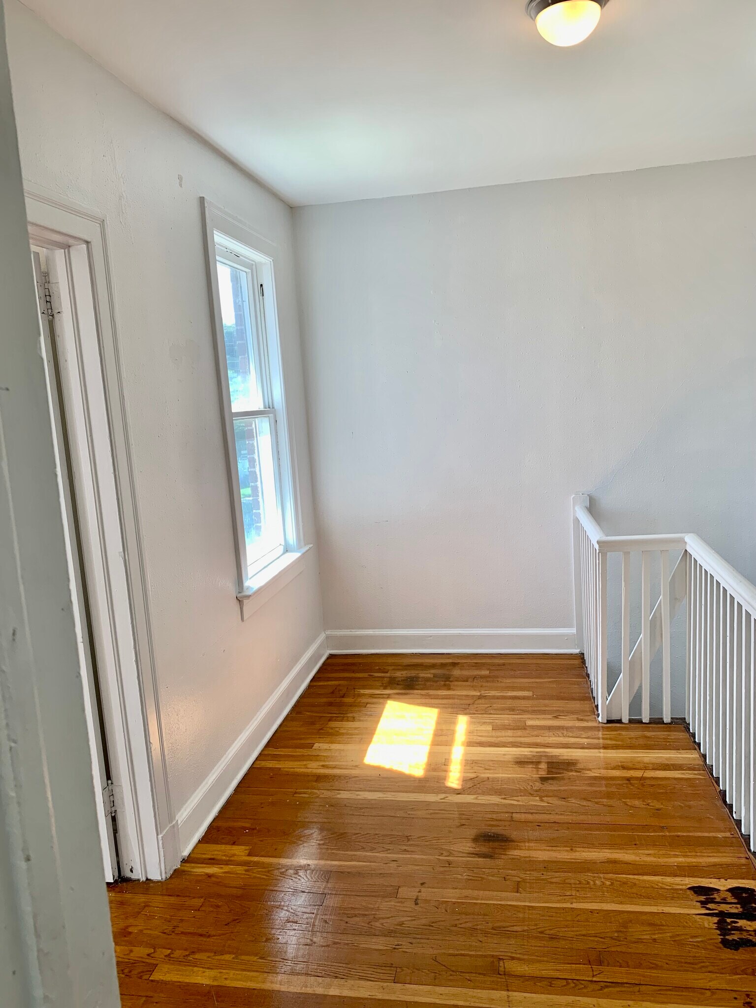 Upstairs landing- great for a book nook - 768 Acosta St