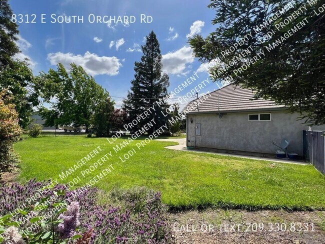 Building Photo - 8312 E Orchard Rd