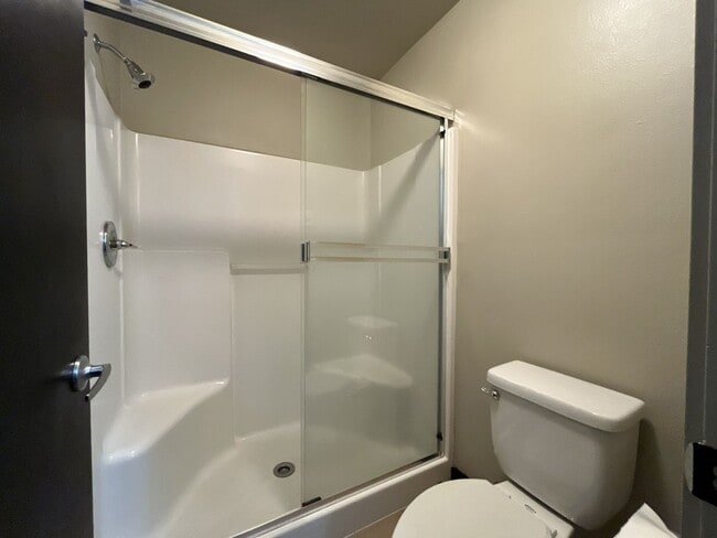 Building Photo - Charming 3 Bedroom, 2.5 Bathroom Home with Large Living Room, Tall Windows, Island Kitchen, and A...