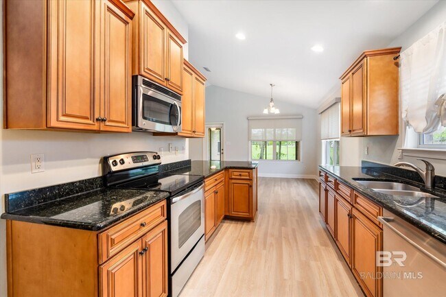 Building Photo - 9534 Woolrich Ave