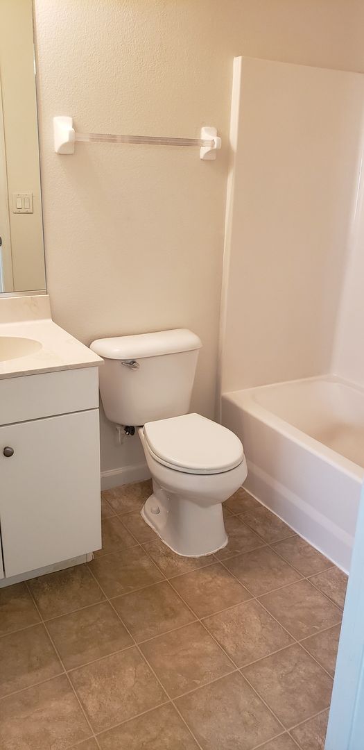 Building Photo - $1550 - 3/2/1 - Palm Coast Duplex - Great Location