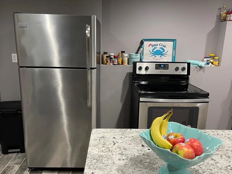 Stainless steel fridge and range - 82 Goose Hill Rd