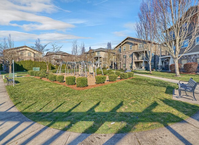 Building Photo - 2BR + 2.1BA Corner Townhome-Style Condo — Dual Primary Suites, Attached Garage & Most Utilities I...
