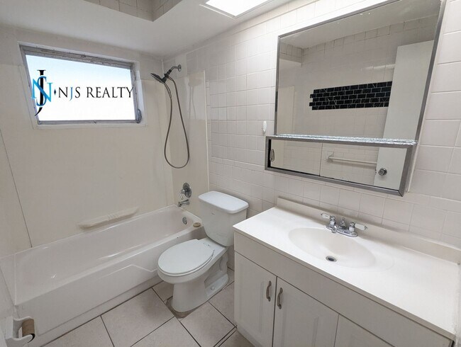 Building Photo - 2/1.5/1 1050 Sq. Ft. home with a FIREPLACE...