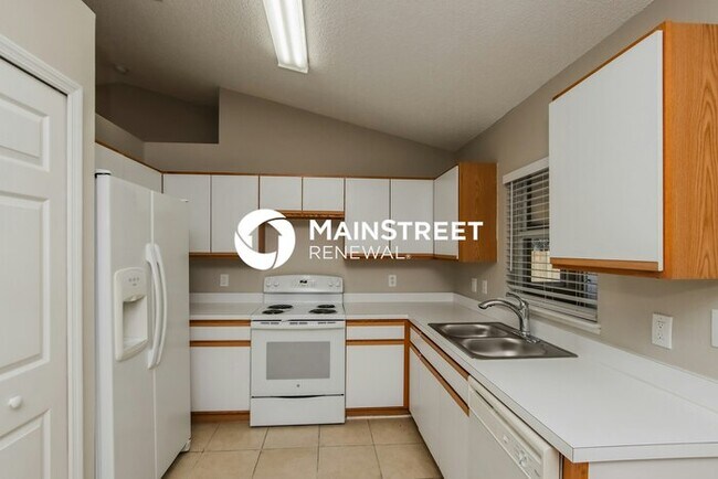 Building Photo - 4 Bedroom Pet-Friendly Home in Palm Bay, FL with Main Street Renewal