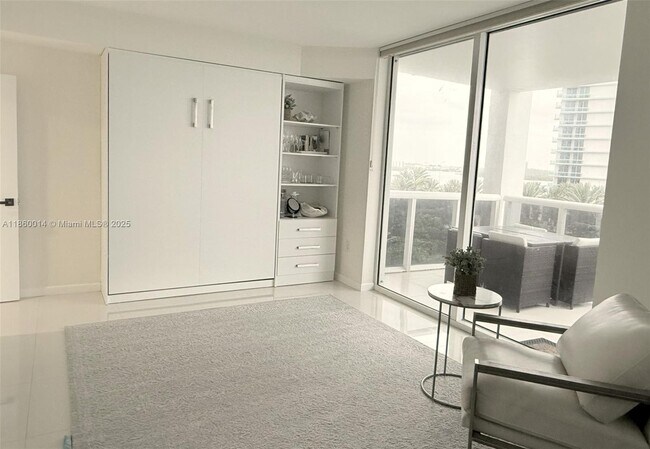 Building Photo - 10275 Collins Ave