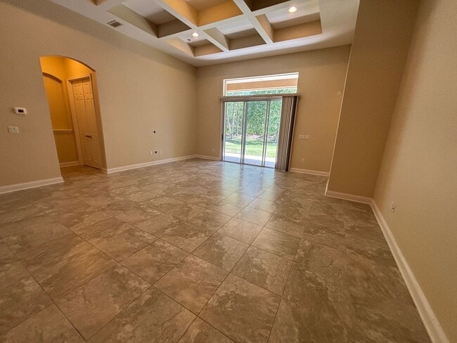 Building Photo - Spacious 4BR/3BA Home with 3-Car Garage, Bonus Office & Covered Patio in St Johns!