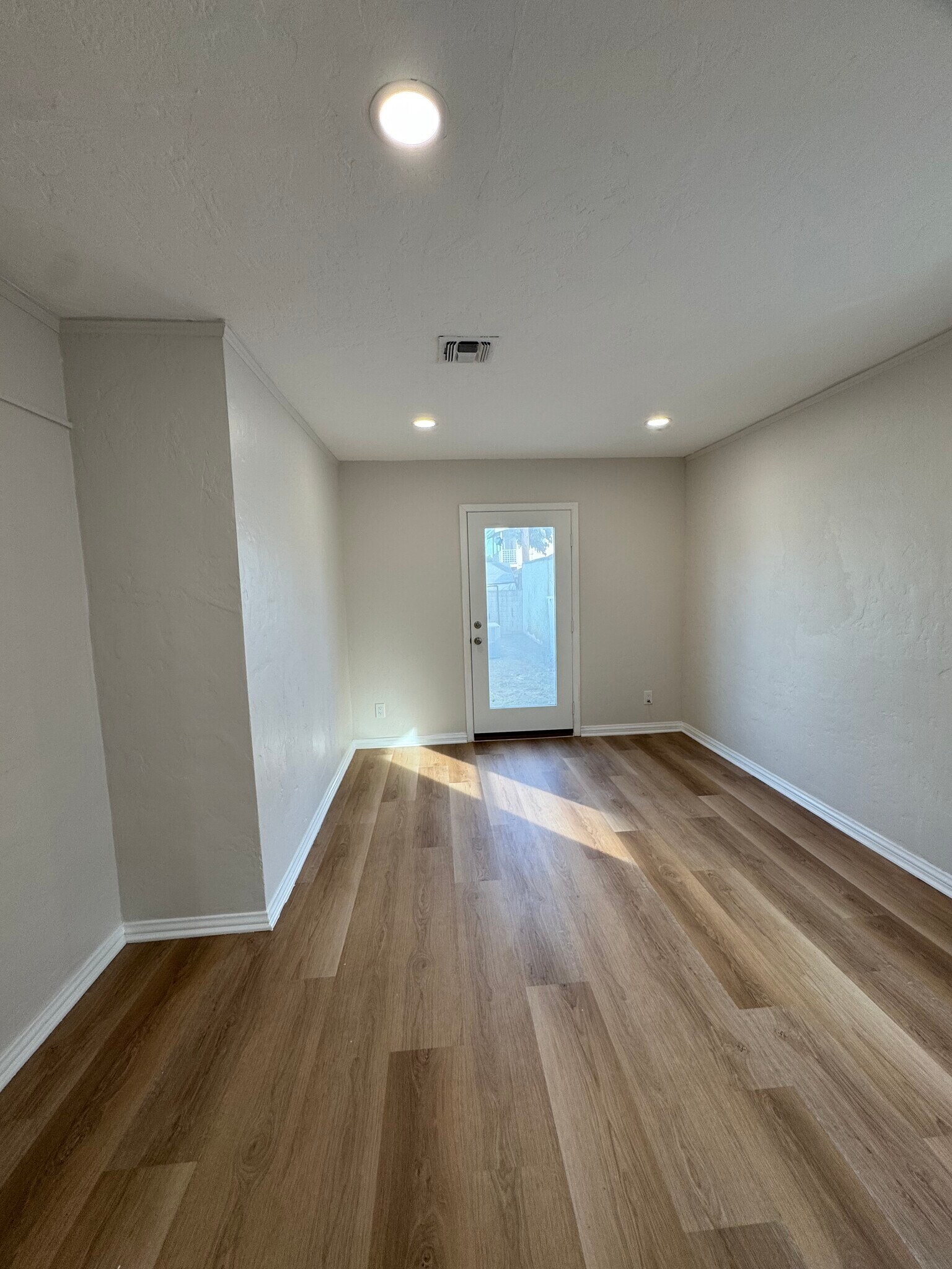 Bedroom 2 with backyard access - 6556 3rd Ave