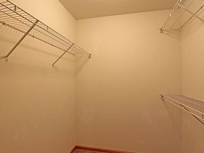 Building Photo - Great NE location -  4 bedroom 2.5 bath with attached 2 stall garage. Close to shopping & restaur...