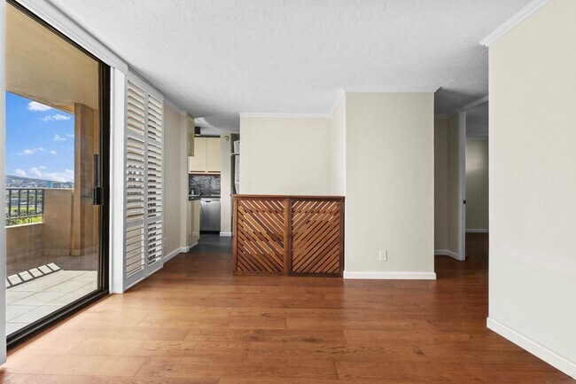 Building Photo - Wake Up to Stunning Mountain & Ala Wai Canal Views in the Heart of Waikiki
