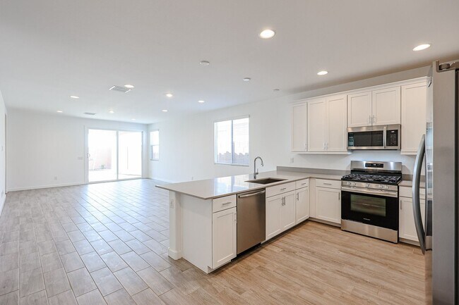 Building Photo - COMING SOON!! Recently built 5-Bedroom Home in Goodyear with Upgrades & Resort-Style Amenities