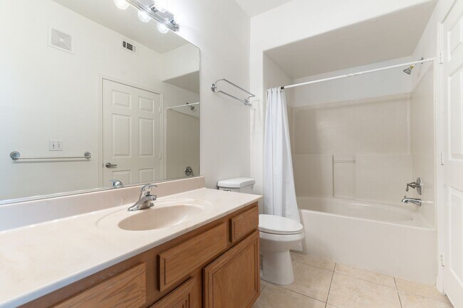 Building Photo - Stylish 1-Bedroom Condo with Private Garag...