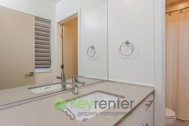 Building Photo - Spacious Living with Balconies, Deck, and Private Yard