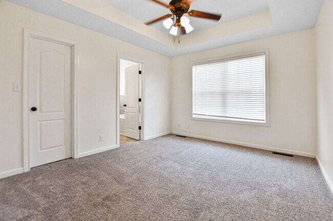 Building Photo - Pet Friendly Three Bedroom with Bonus!