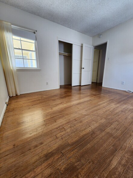 Bedroom 1 with wardrobe closet - 1107 Florida St