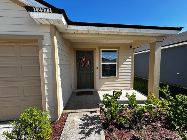 Building Photo - Picturesque Waterfront 4-Bedroom Home with...