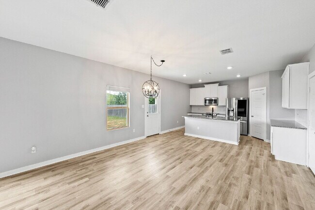 Building Photo - 4 Bedroom Corner Lot Rental with Spacious ...
