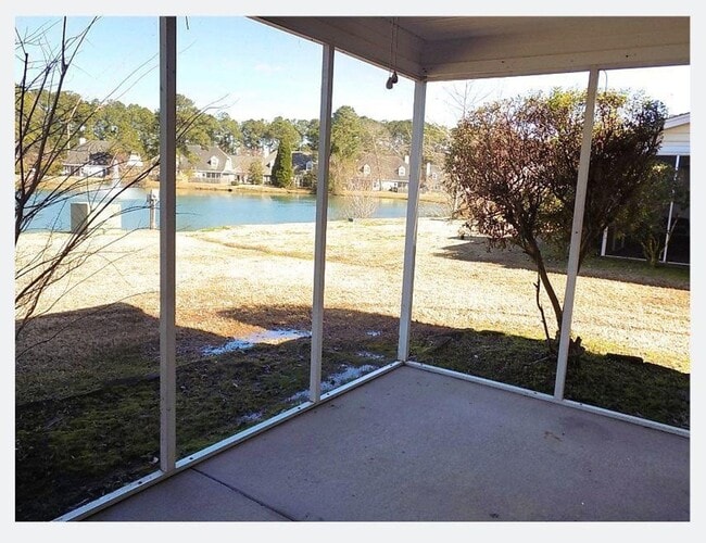 Building Photo - Spacious Condo with Expansive Pond Views