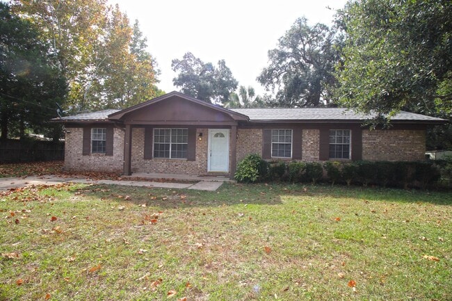 Building Photo - Spacious 3BR/1.5BA Home in Pace with Open Living Area, Tiled Family Room, and Fenced Backyard – M...