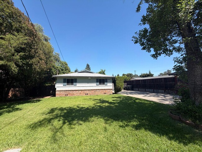 Building Photo - Adorable house with large deck,  yard and RV access