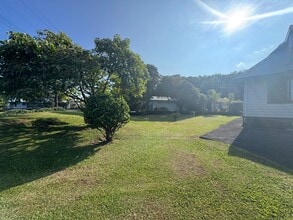 Building Photo - Fully Furnished- All Utilities Included- 3 Bedroom/ 2.5 Bath