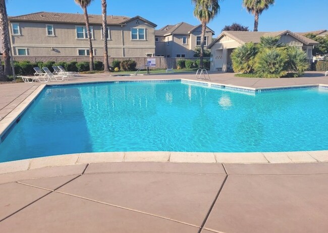 Building Photo - Cute As A Bug 3/2 Natomas Home!  (Please see attached info for viewings!