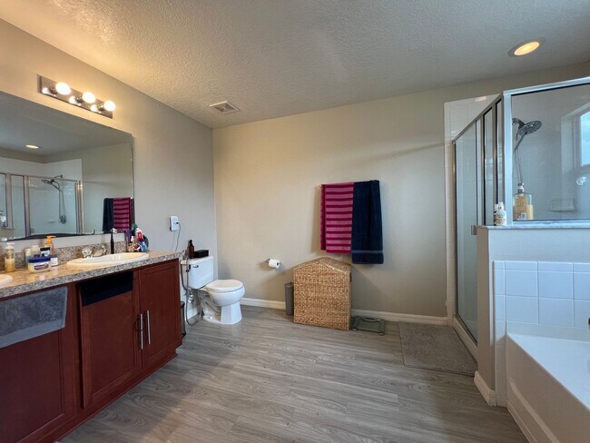 Building Photo - Updated 4 Bedroom, 3 1/2-bathroom home