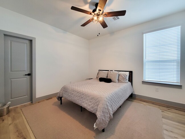 Building Photo - This 4-bedroom, 3-bathroom, two-story residence comes with a generous two-car attached garage. Re...