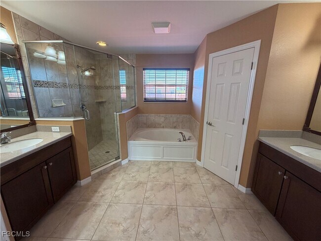 Building Photo - 16511 Whispering Trace Ct