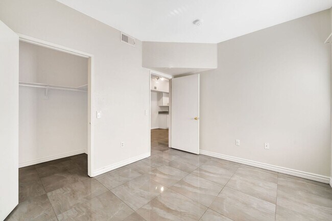 Building Photo - Modern Gated Condo with Upgraded Interior and Attached Garage in Prime South Las Vegas Location!