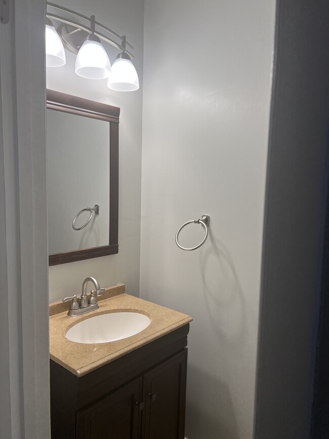 Half Bath on Main Floor - 7711 Heatherside Ln