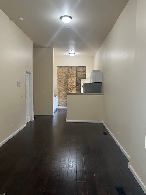 Living room to kitchen - 12705 Honore St