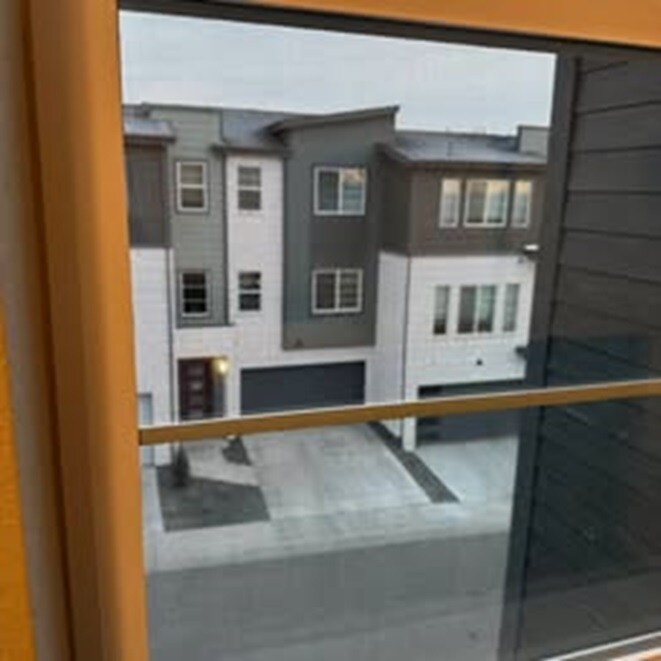 Building Photo - 1566 W 67th Dr
